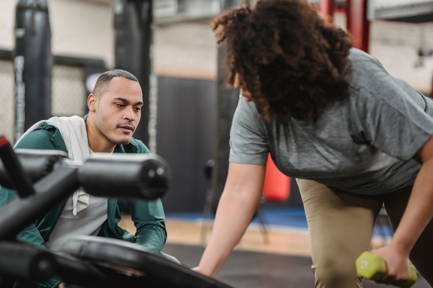 A coach training a client at C2E Movement